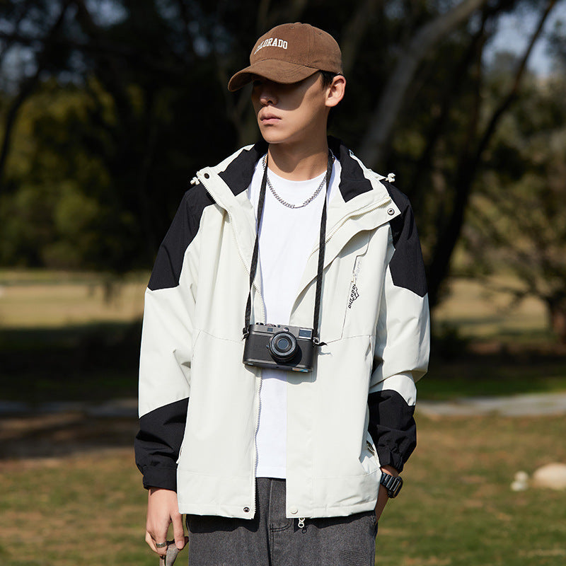 Women two-layer water-repellent outdoor jacket with hood, waist adjustment and contrast piping