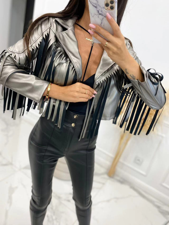Women’s short jacket in biker style with metallic look and long leather fringes