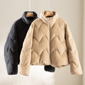 Women's short quilted jacket with wave quilting, high stand-up collar and boxy silhouette