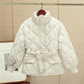 Women's quilted tailored quilted jacket with wrap belt, stand-up collar, and flap pockets