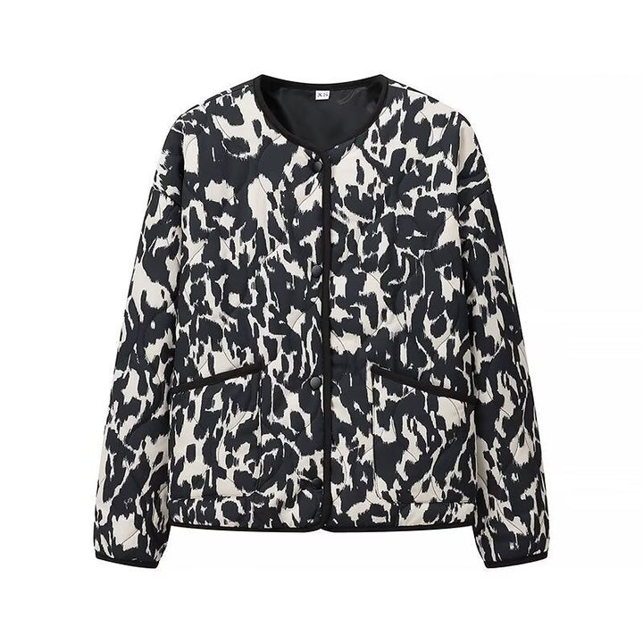 Women’s quilted jacket in oversized boxy cut with round neckline and abstract animal print