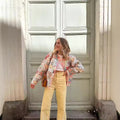 Women's quilted jacket in patchwork bandana design with round neck and patch pockets