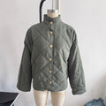 Women Padded Quilted Jacket with Stand-up Collar and Oversized Cut