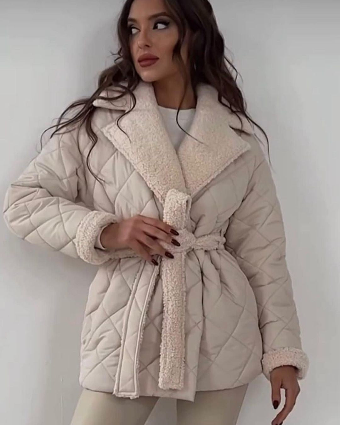 Women’s quilted jacket with teddy lining, fitted belt and large shawl collar