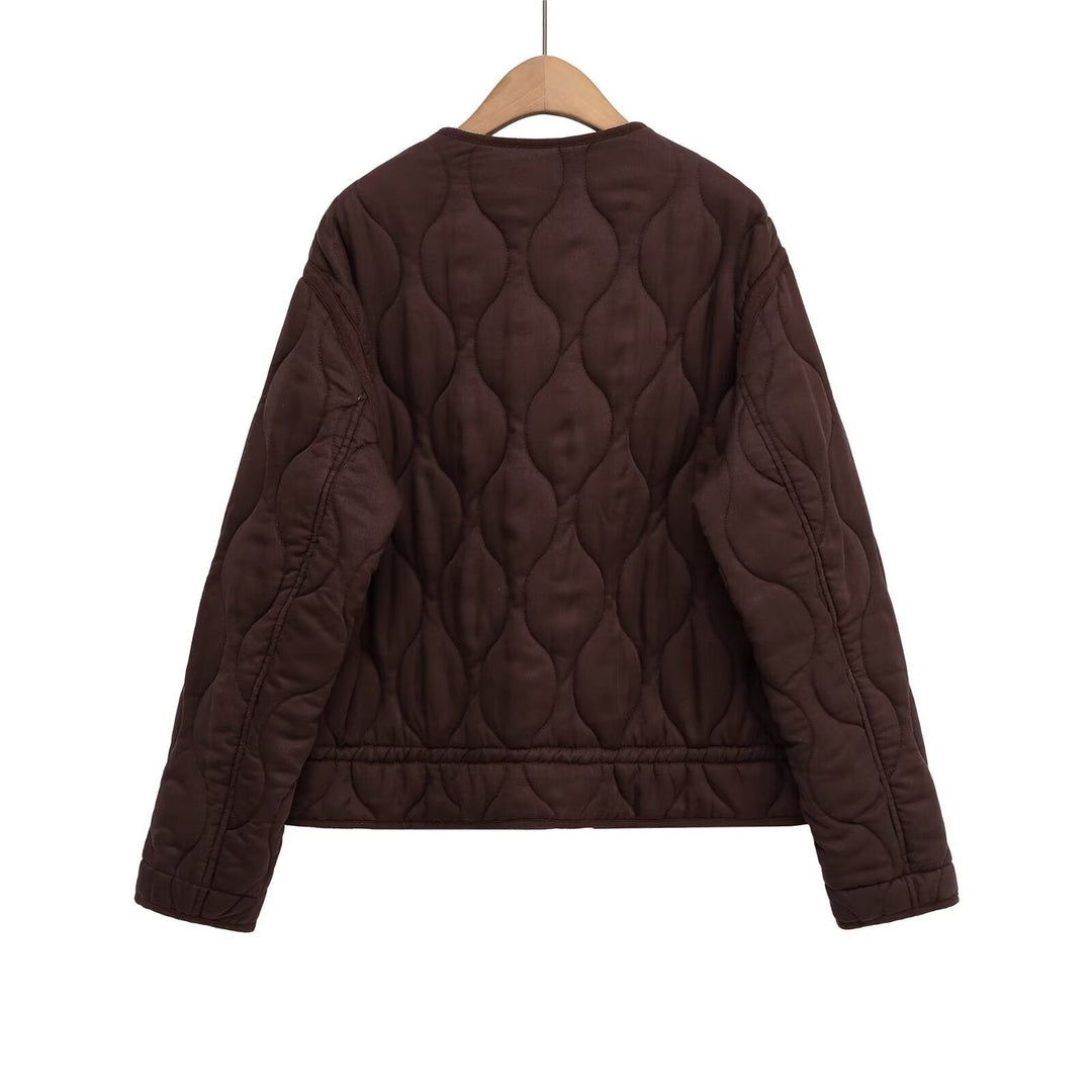Women quilted transition jacket with zip and button placket, round neck and drawstring