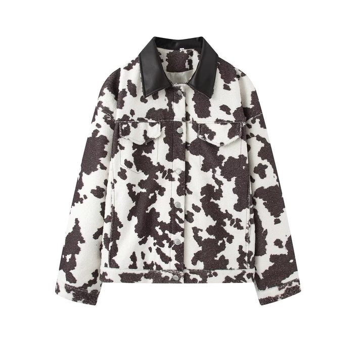 Women’s teddy trucker jacket with cow spot pattern and faux leather collar