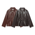 Women's cropped jacket in vegan leather look with cinching drawstring and flap pockets