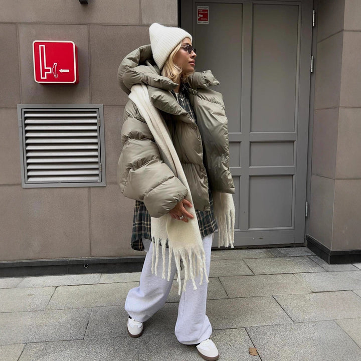 Women extravagant oversized quilted down jacket with extra voluminous hood