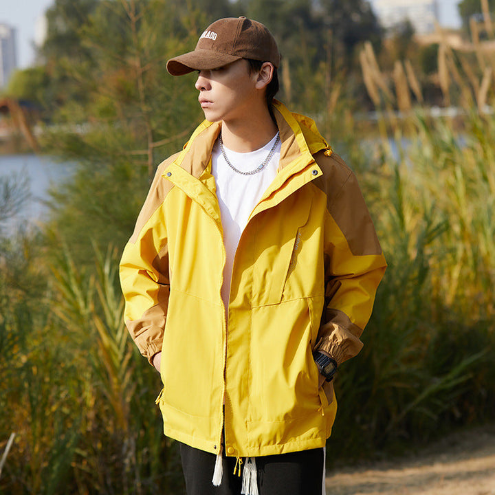 Women two-layer water-repellent outdoor jacket with hood, waist adjustment and contrast piping