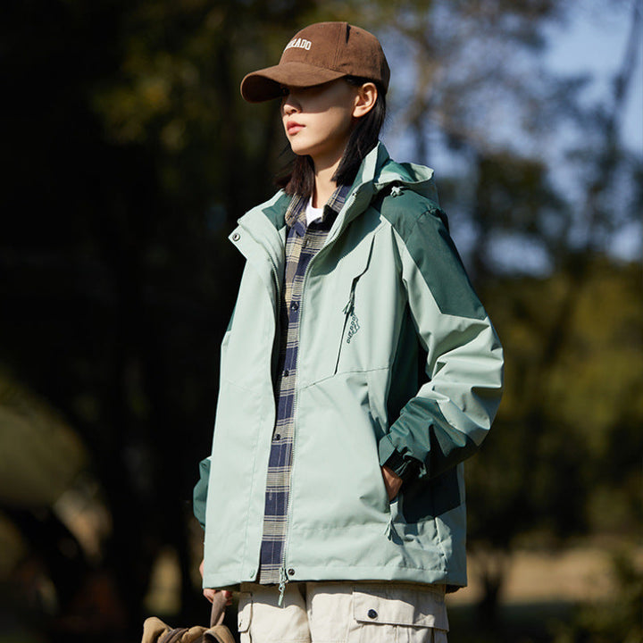 Women two-layer water-repellent outdoor jacket with hood, waist adjustment and contrast piping