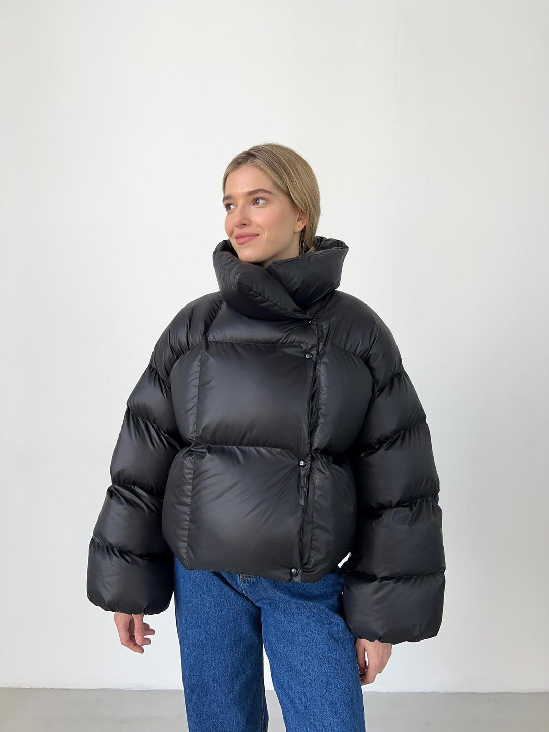 Women extravagant oversized quilted down jacket with extra voluminous hood