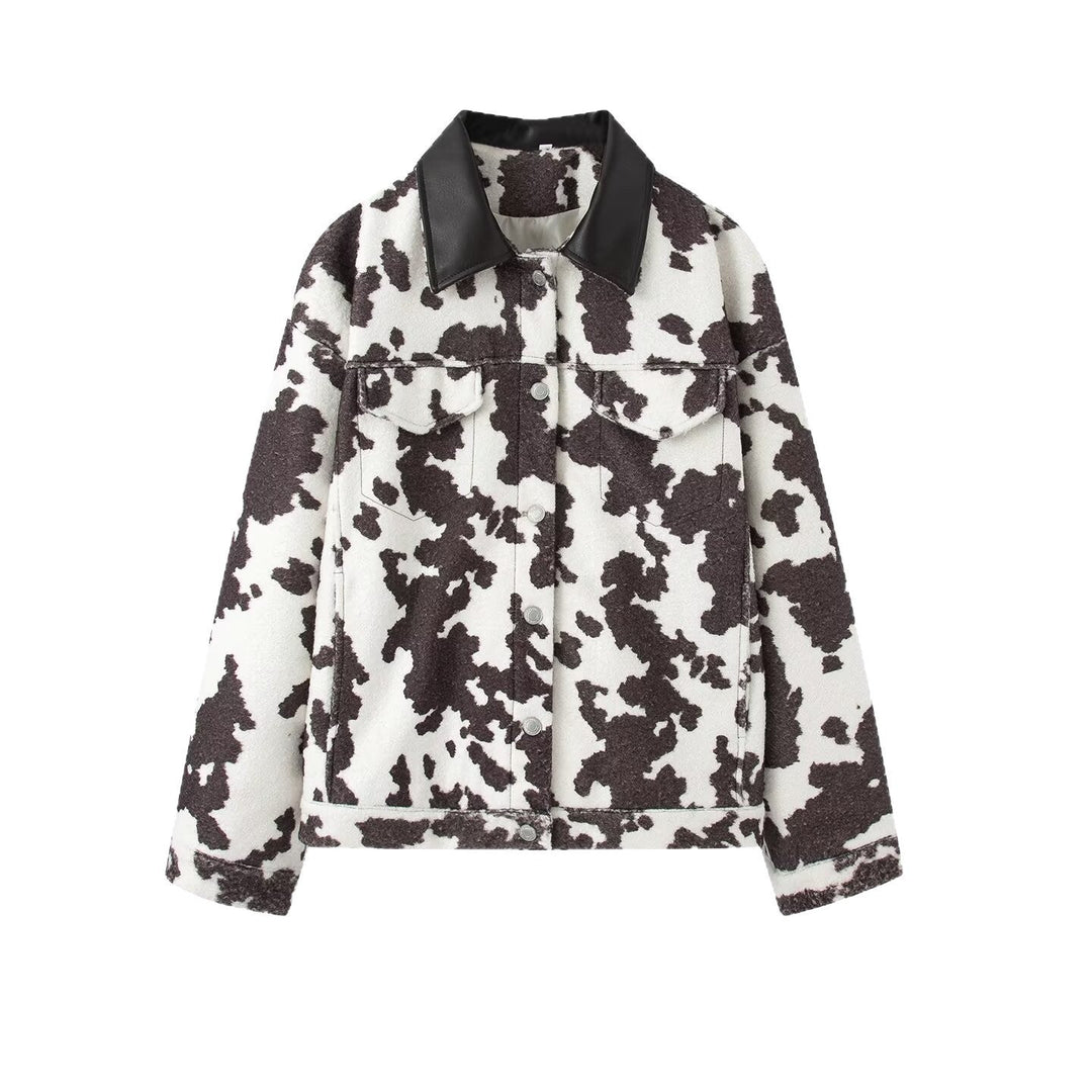 Women’s teddy trucker jacket with cow spot pattern and faux leather collar