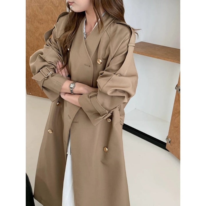 Women Long Cut Trench Coat with Double-Breasted Button Placket and Adjustable Sleeve Straps