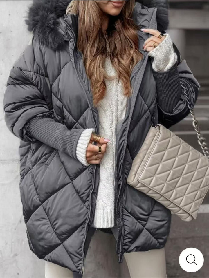 Women longer quilted winter parka with large hood and faux fur trim