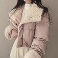 Women's short quilted puffer jacket with teddy collar, roll-up sleeves, and drawstring hem
