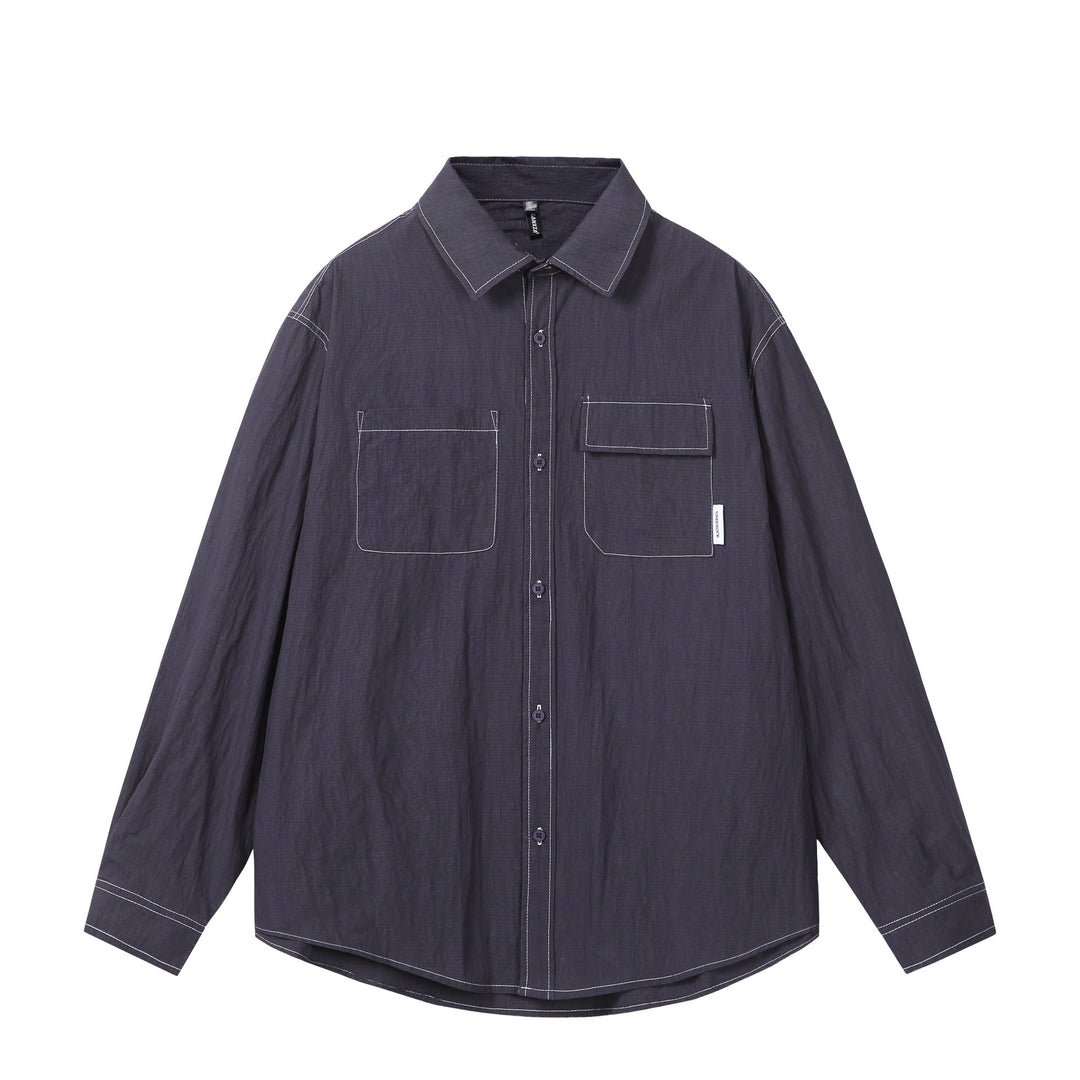 Unisex Oversize Shirt Jacket with prominent contrast stitching and patch chest pockets