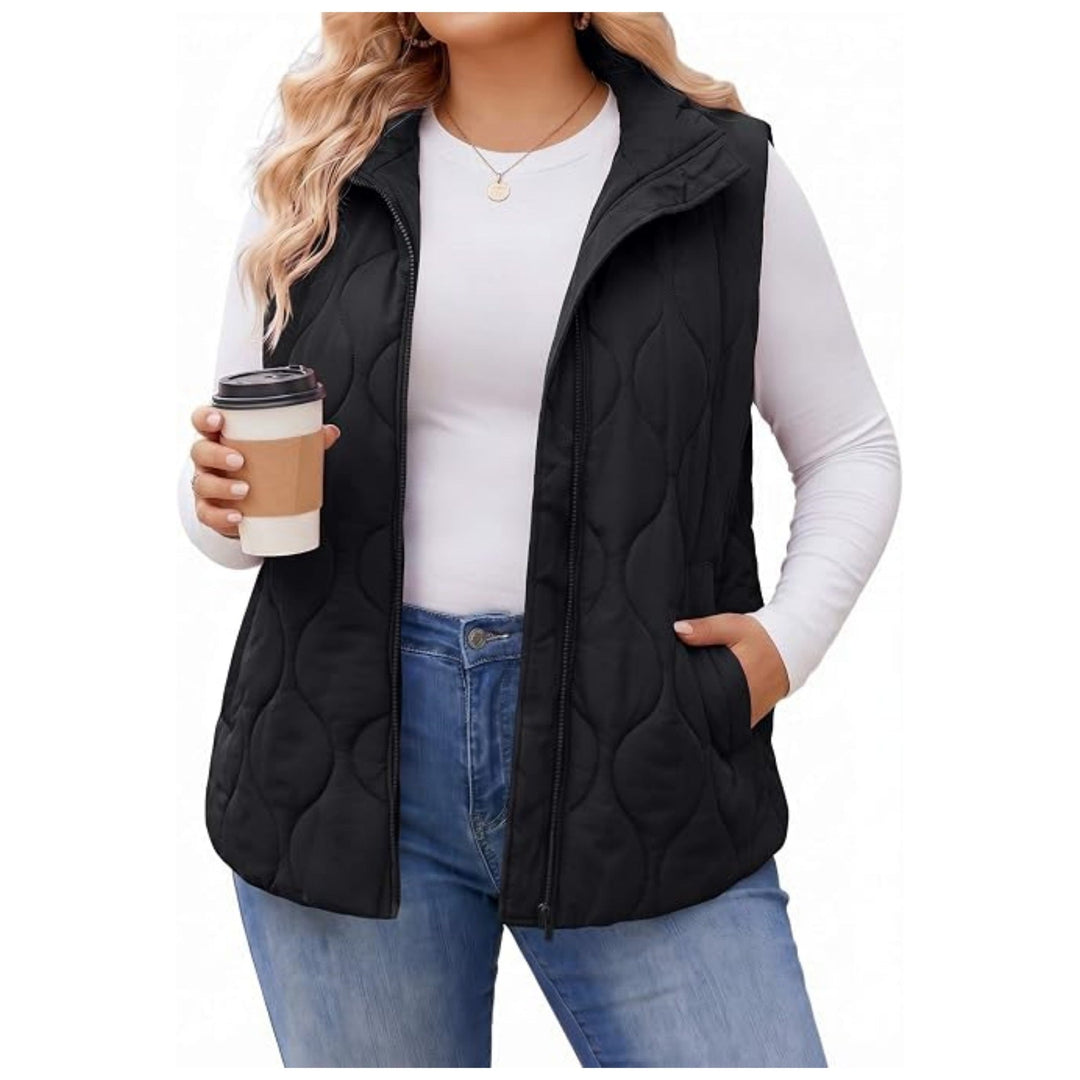 Ladies quilted vest with high collar, figure-flattering silhouette and side pockets