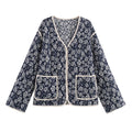 Ladies quilted jacket with floral allover, V-neck, contrast piping and patch pockets
