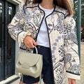 Women's Quilted Paisley Print Quilted Jacket with Contrast Piping and Round Neckline