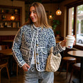 Women quilted transitional jacket withStand-up collar, paisley print and contrasting piping