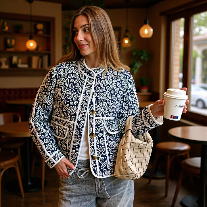 Women quilted transitional jacket withStand-up collar, paisley print and contrasting piping