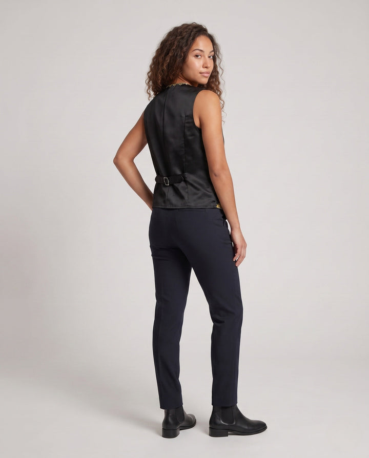 Ladies elegant vest with intricate golden embellishments