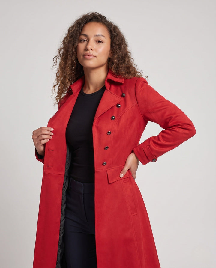Women’s long coat with elaborate buttons and elegant silhouette