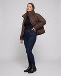 Women's boxy cropped quilted jacket with extra high hood trim and soft cuffs