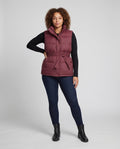 Women's unquilted without sleeves gilet with a fitted belt, with High Collar and concealed snap buttons placket