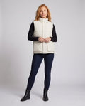 Women's padded quilted gilet with high stand collar collar and patch flap pockets
