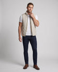 Men's thermally padded gilet quilted with high stand collar and full zip