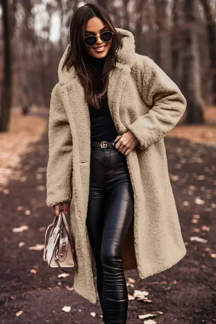 Long coat with elegant faux fur warmth and Timeless style